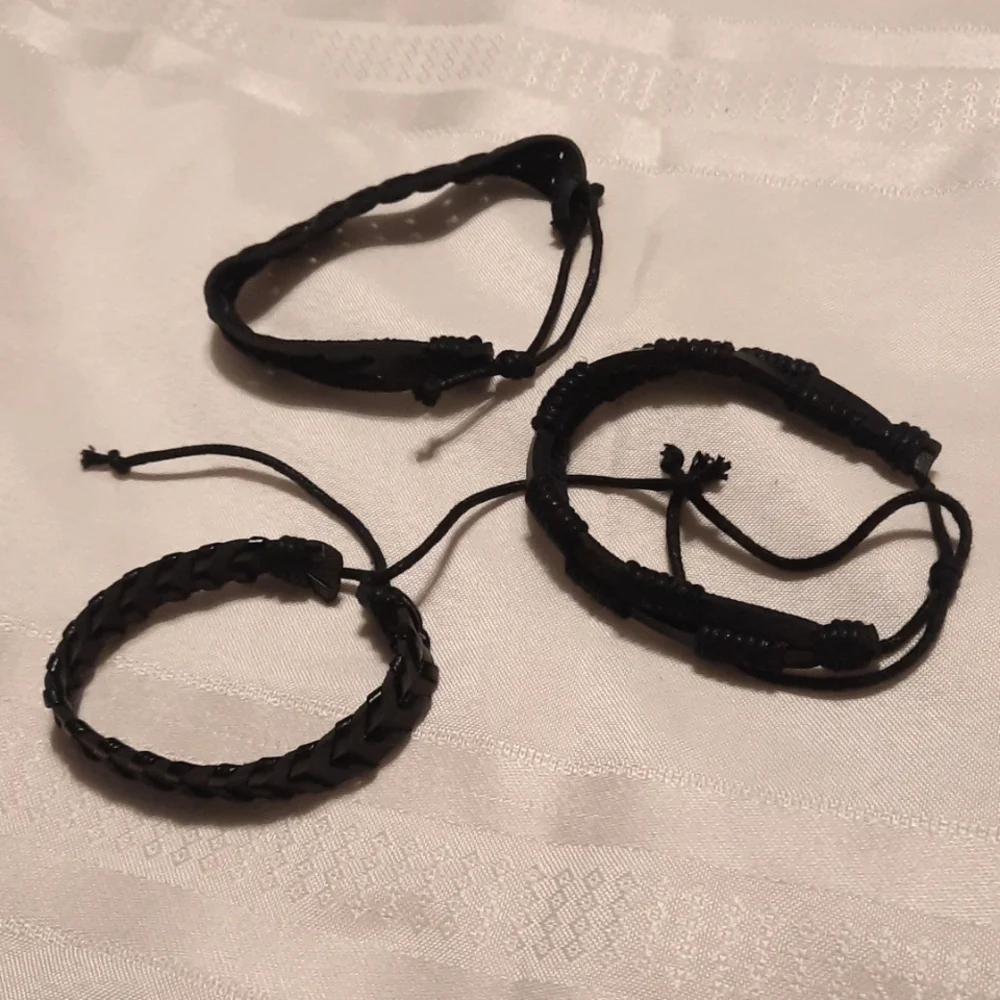 3 black bracelets